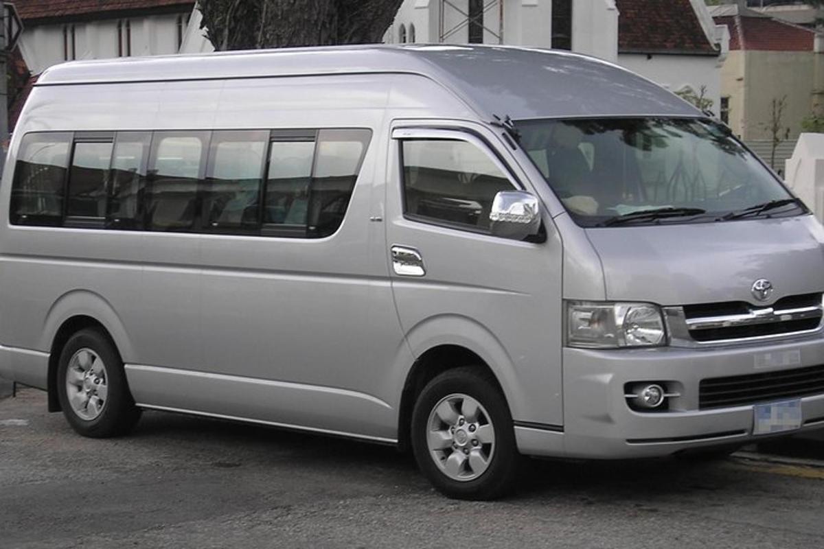 a silver van parked in a parking lot