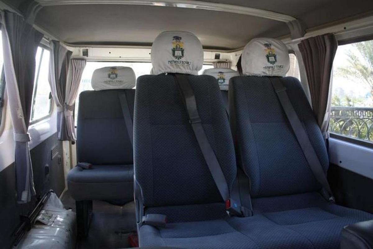 two seats in the back of a van