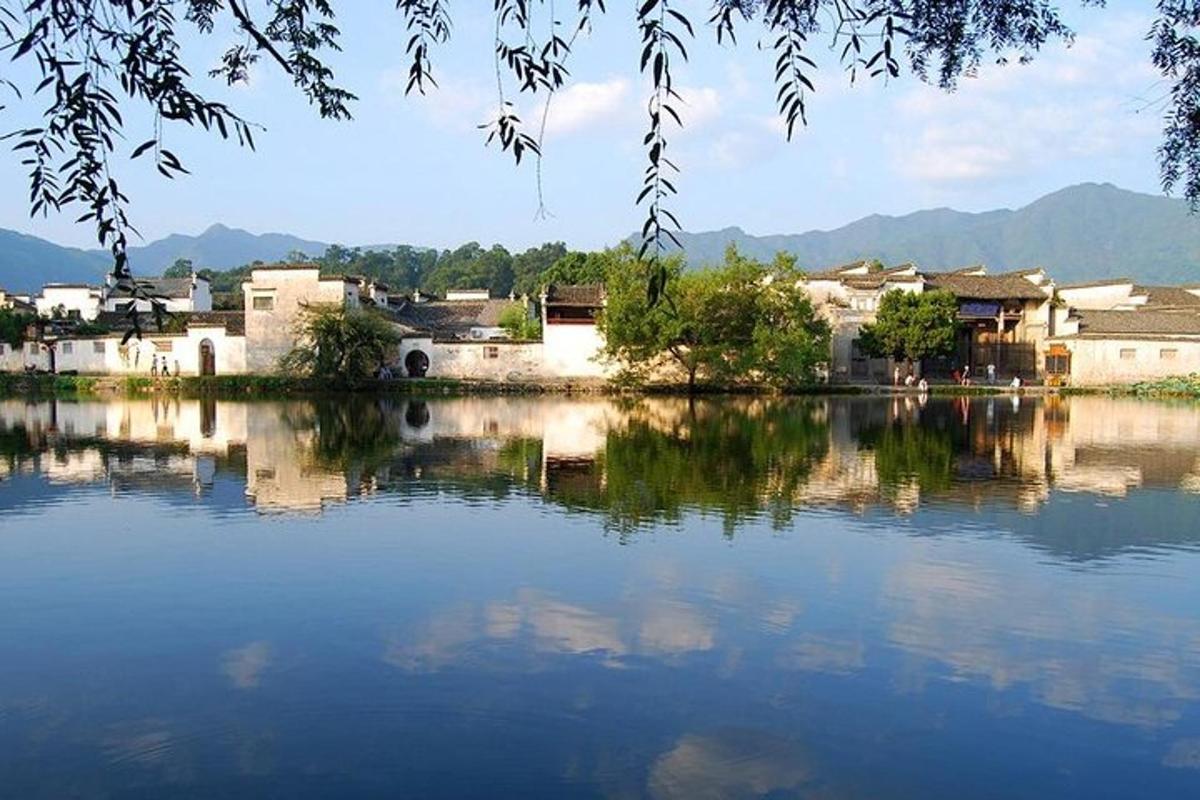 a large body of water with houses and buildings