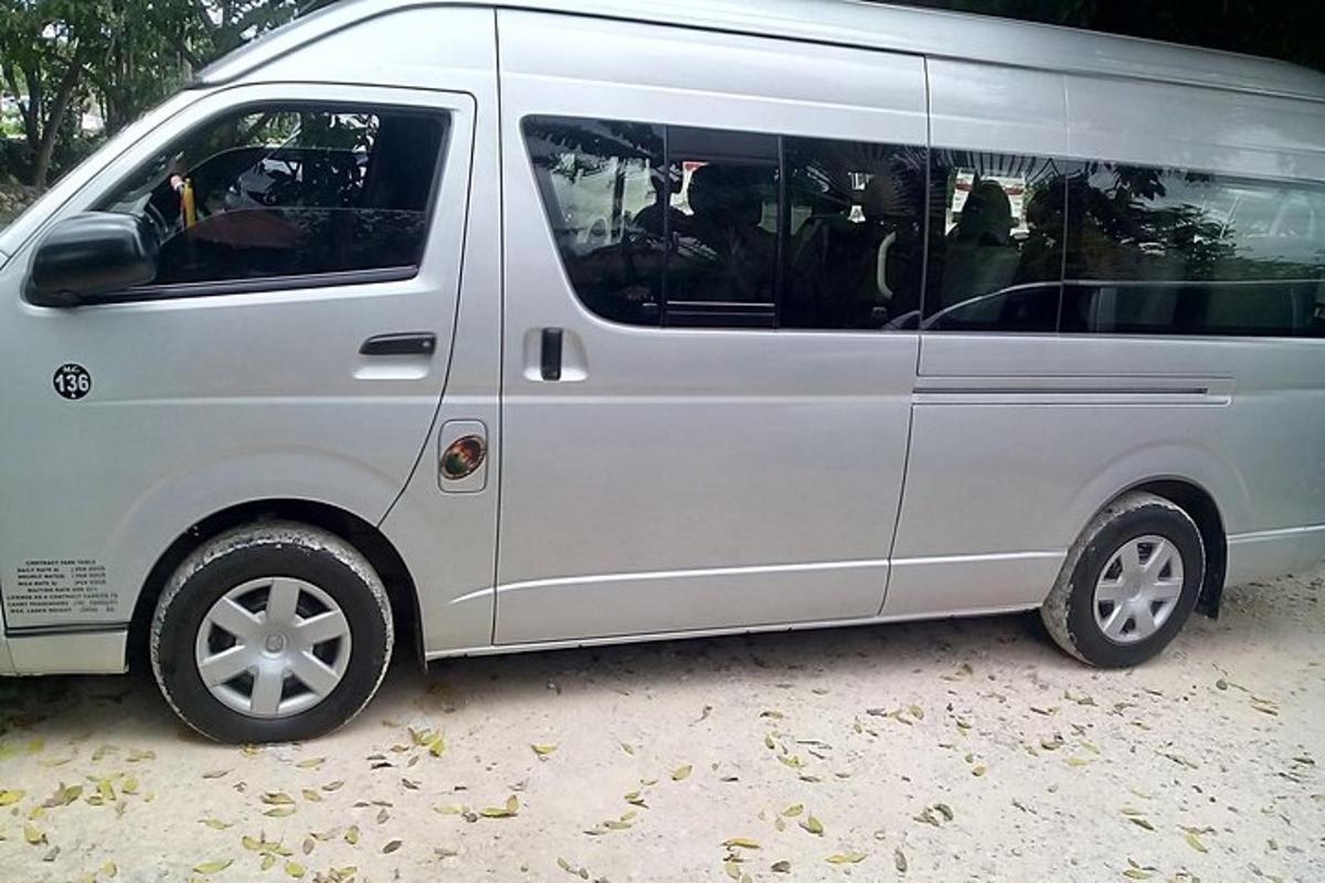a silver van is parked on the ground