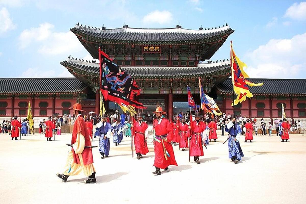 a group of people walking in front of a building