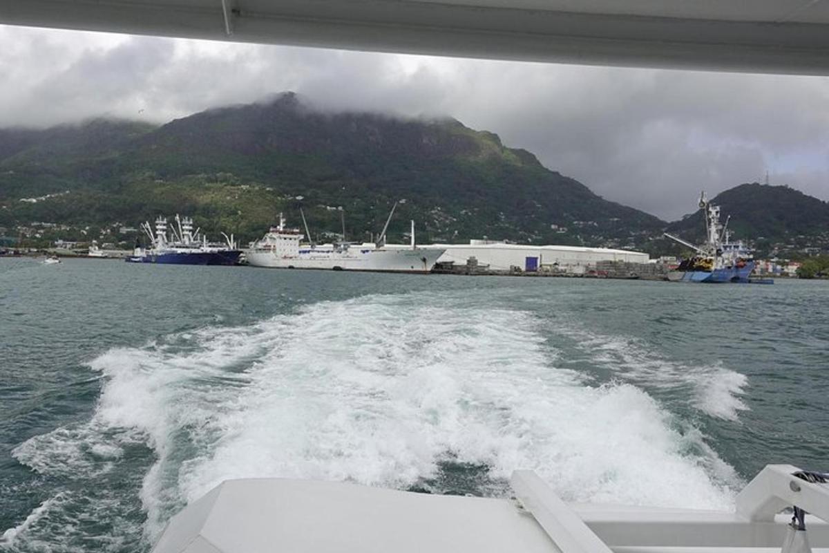 a view from the back of a boat in the water