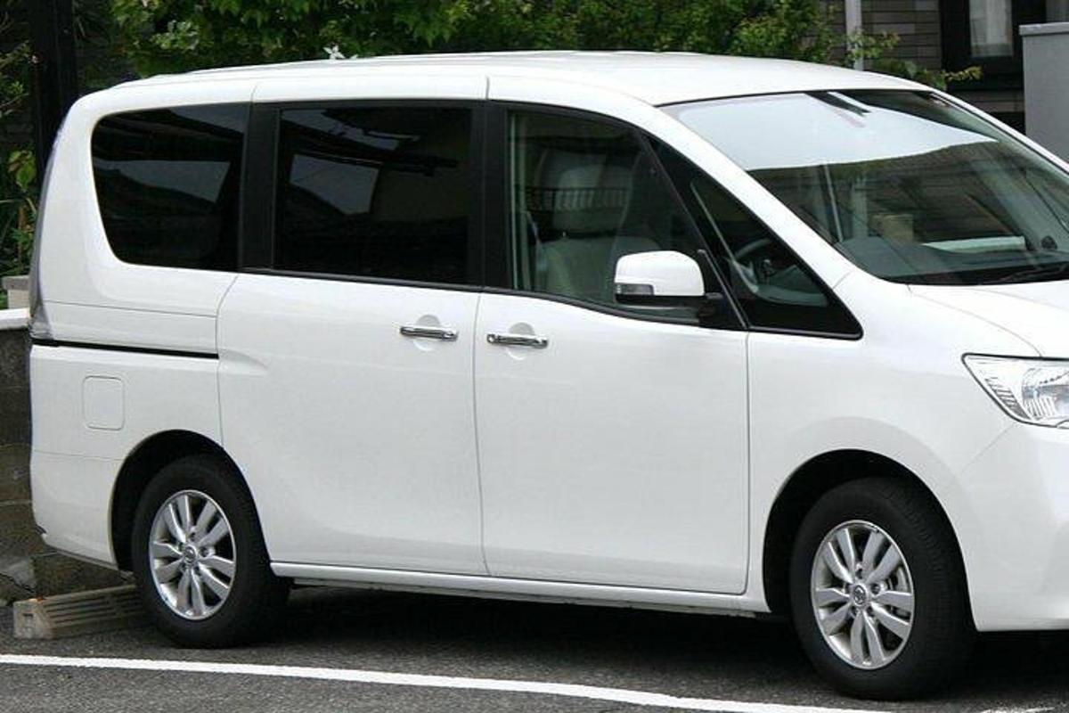 a white van parked in a parking lot