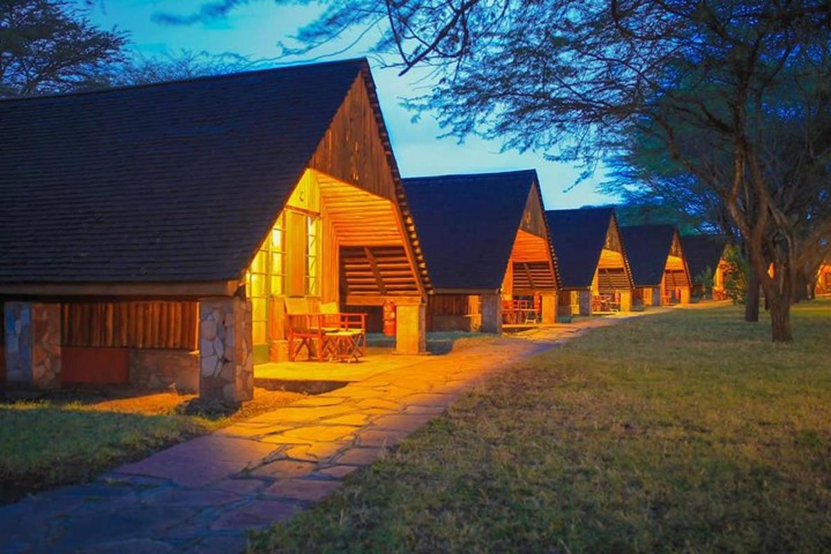 a row of wooden cabins in a row