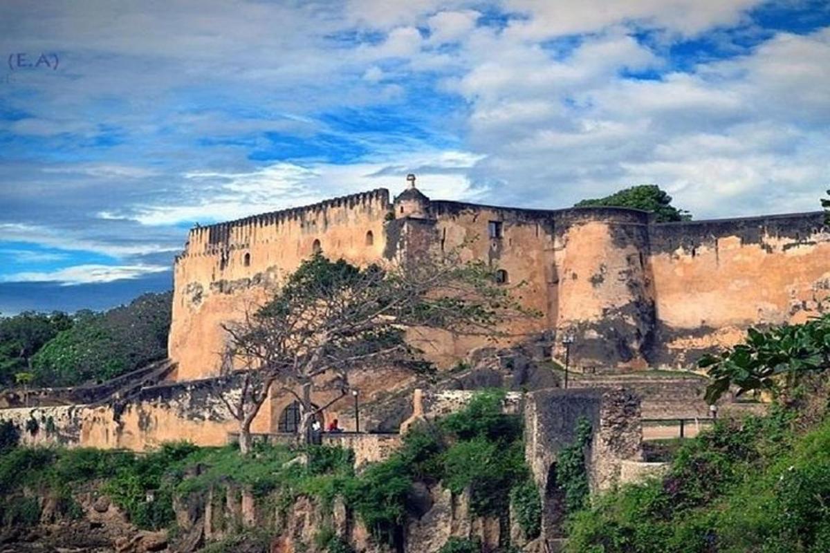 a large castle sitting on top of a mountain