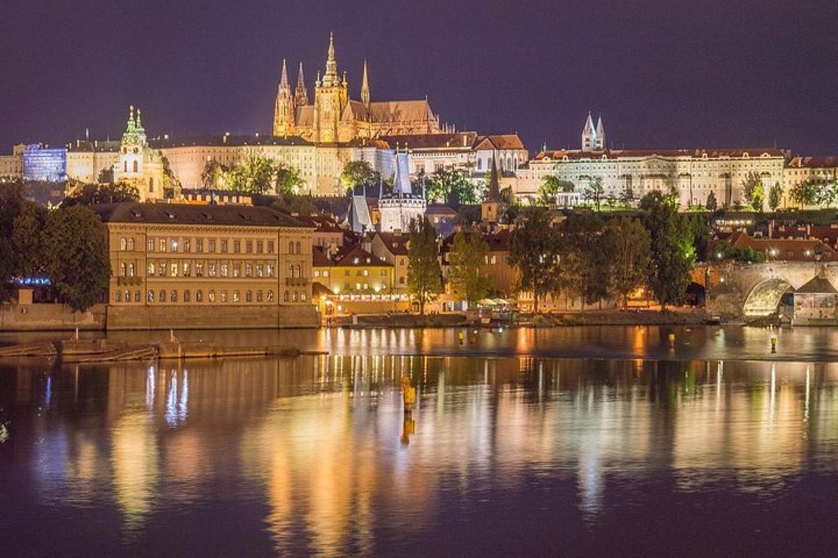 a view of a city at night with a river