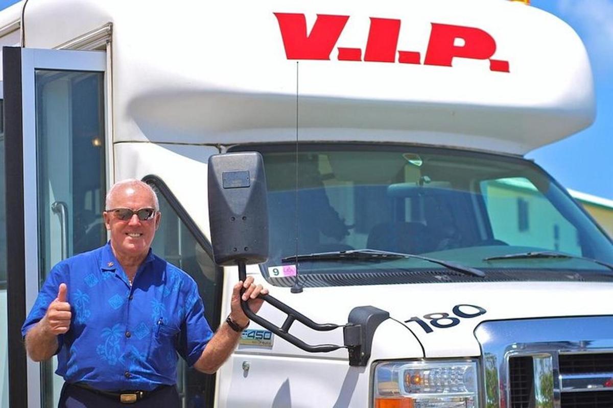 a man giving a thumbs up in front of a truck