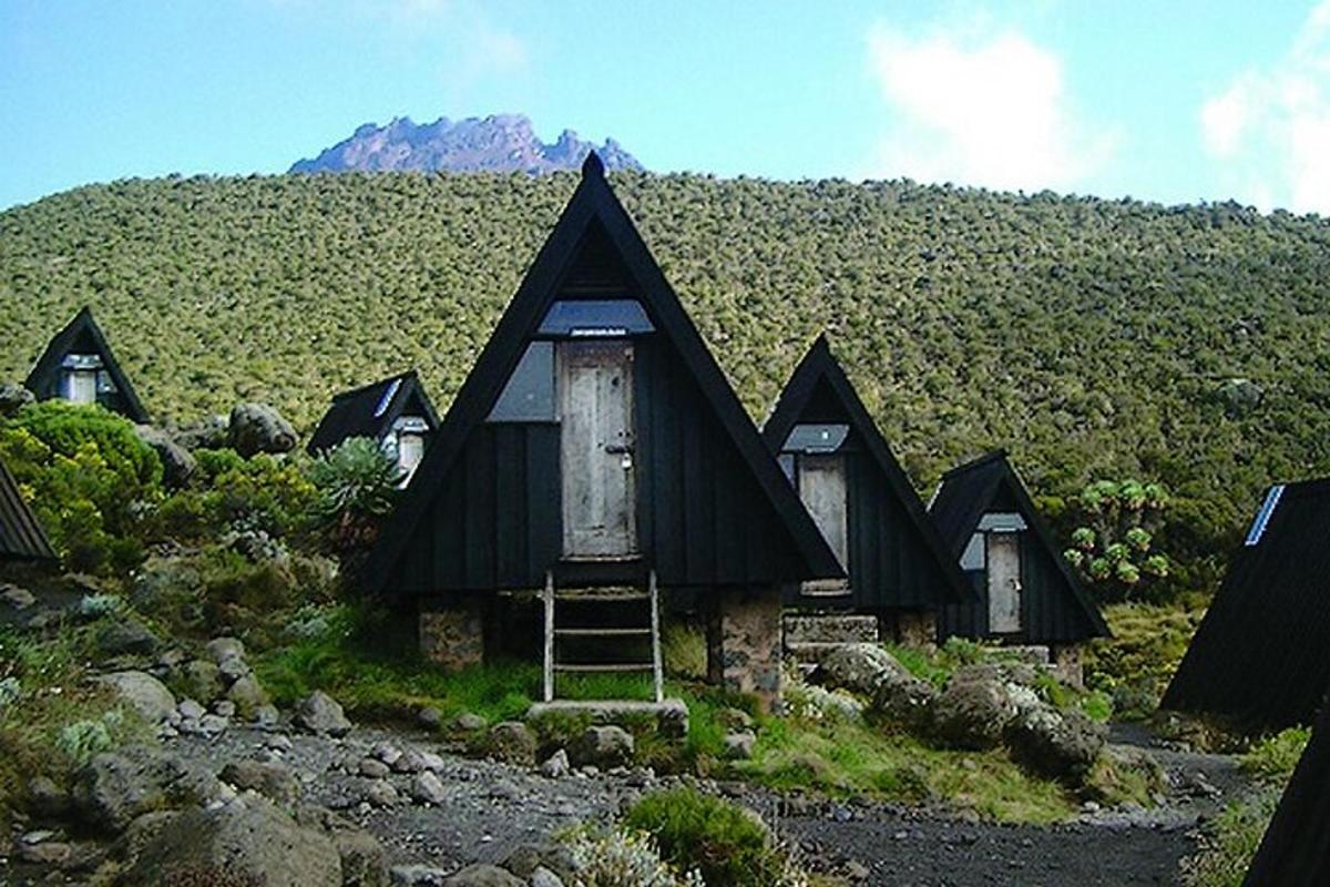 a small house on the side of a mountain