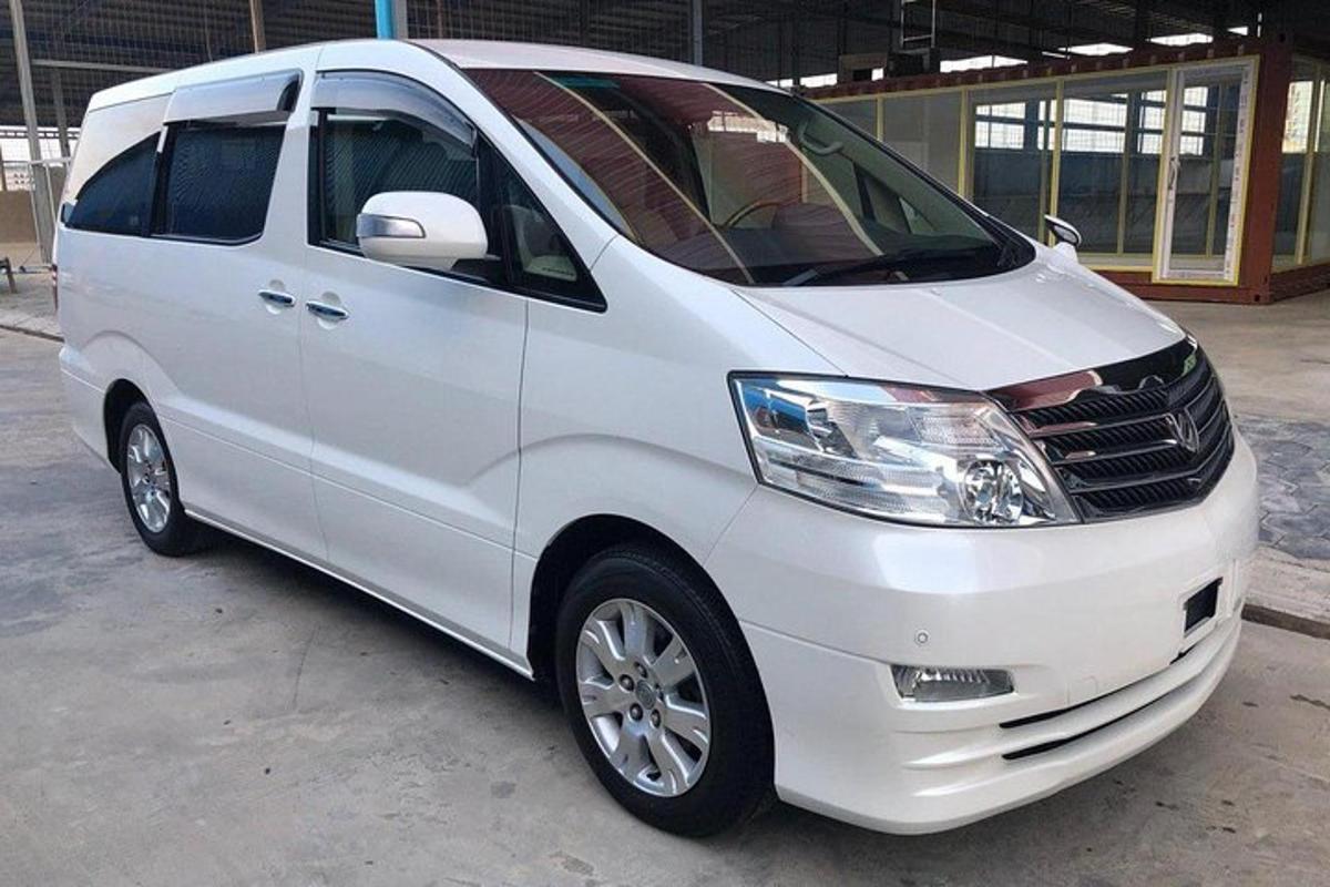 a white van parked in a parking lot