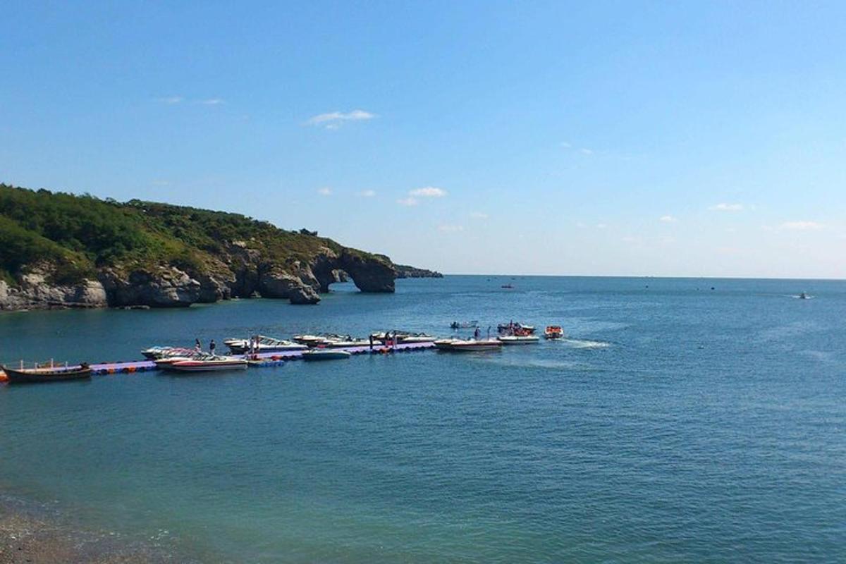 a group of boats in a large body of water