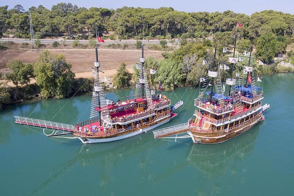 two large boats in the water next to each other