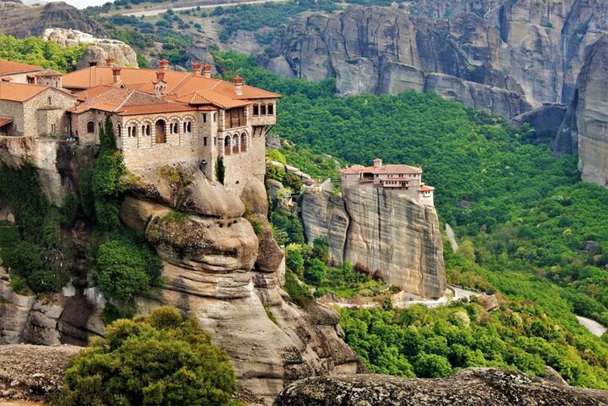 a castle on the side of a cliff