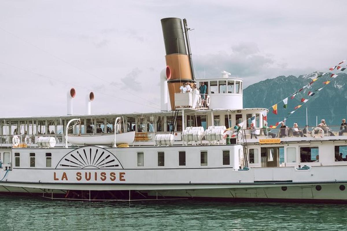 a large boat in the water with people on it