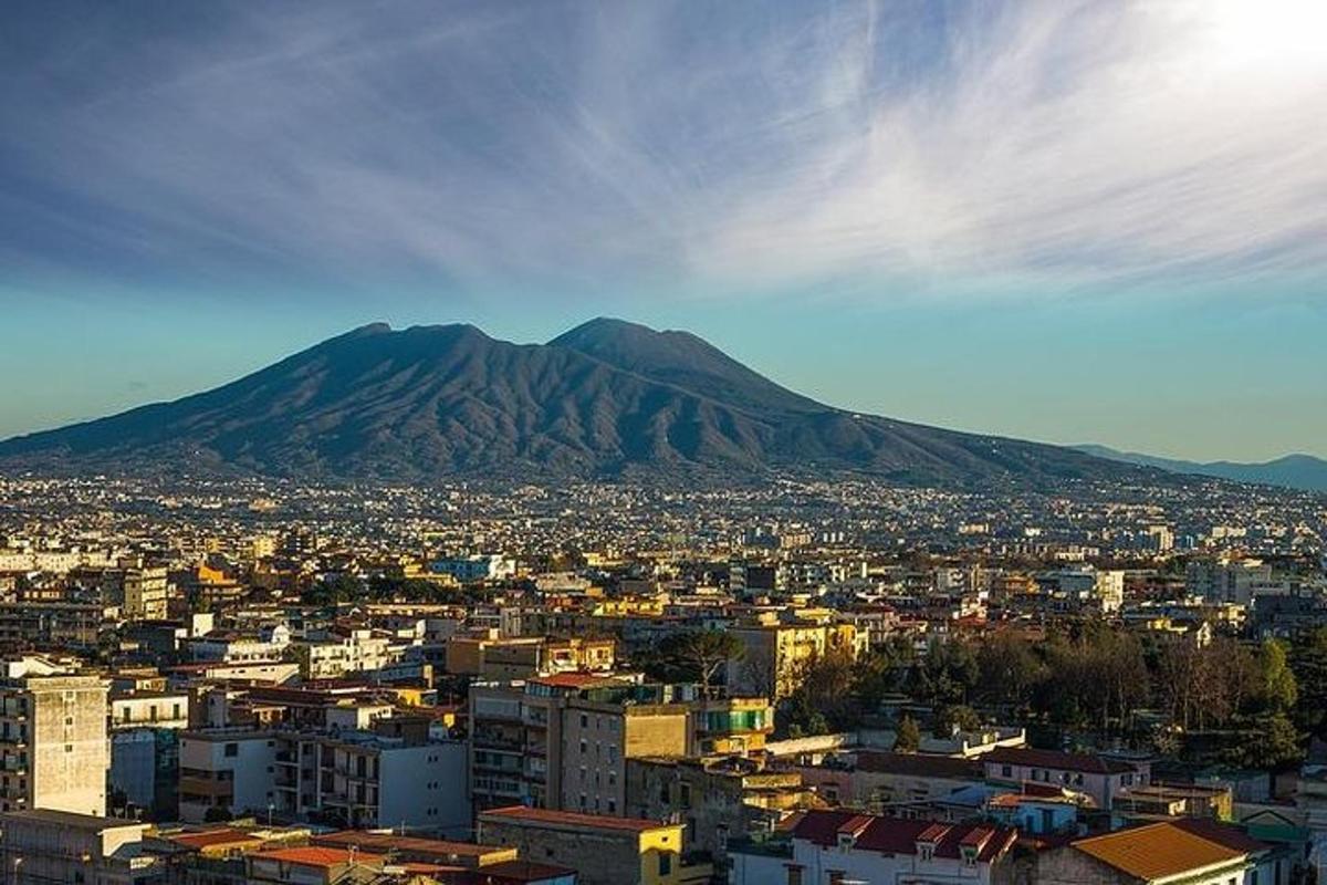 a view of a city with a mountain in the background