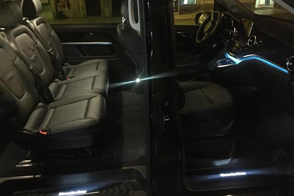 a rear view of the back of a car with the back seats