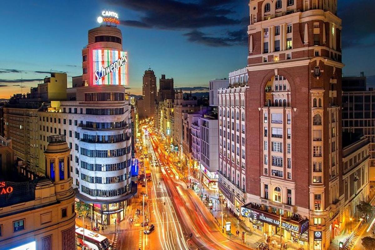 a view of a city with traffic at night