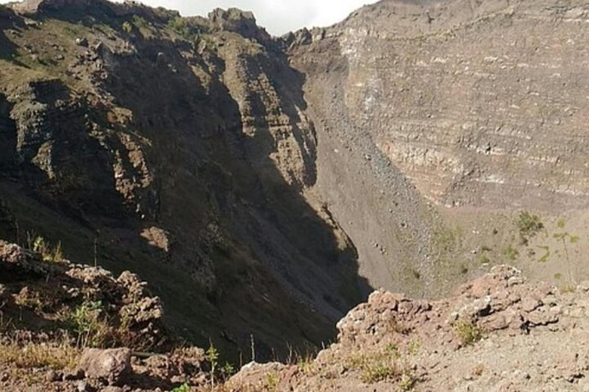a view of a rocky mountain with a road