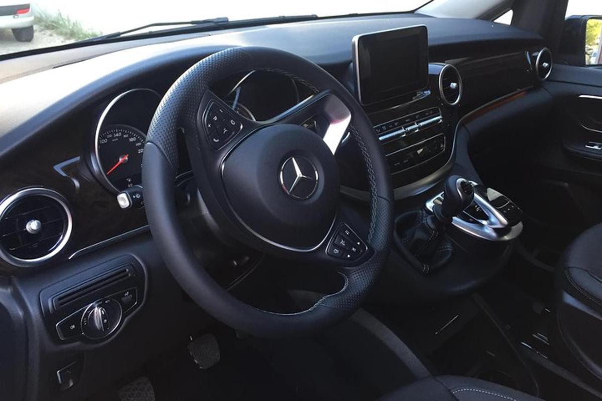 a view of the steering wheel of a car