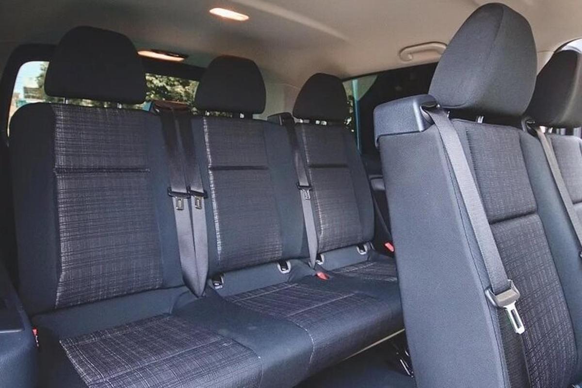 a back seat of a car with empty seats