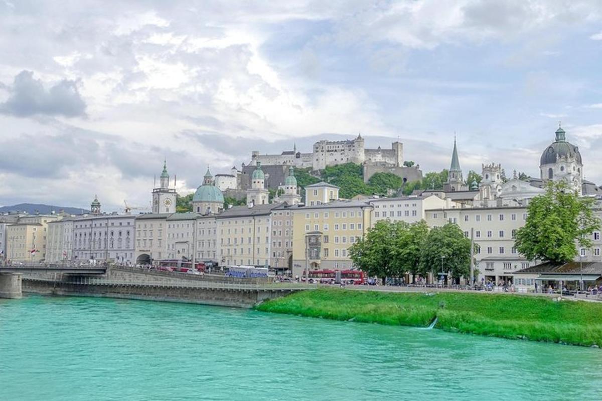 a view of a city with a river and buildings