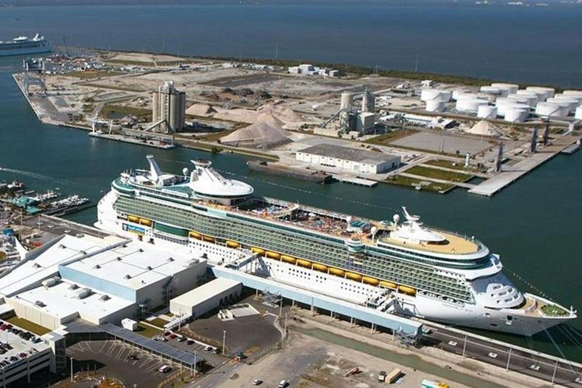 an overhead view of a cruise ship in a harbor