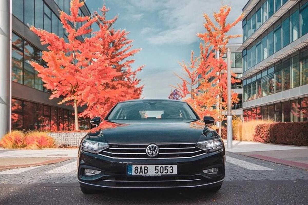 a black car parked in front of a building