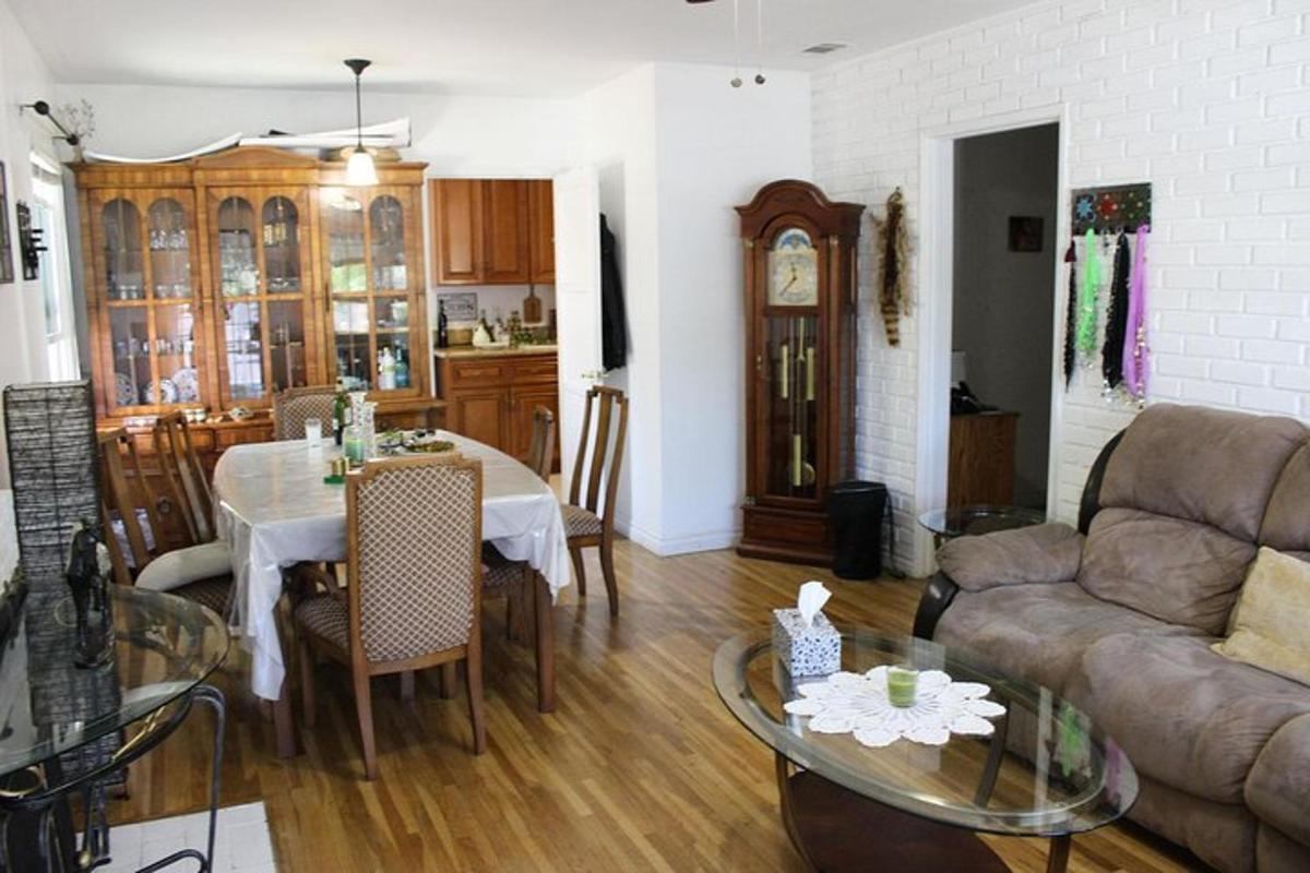 a living room with a couch and a table