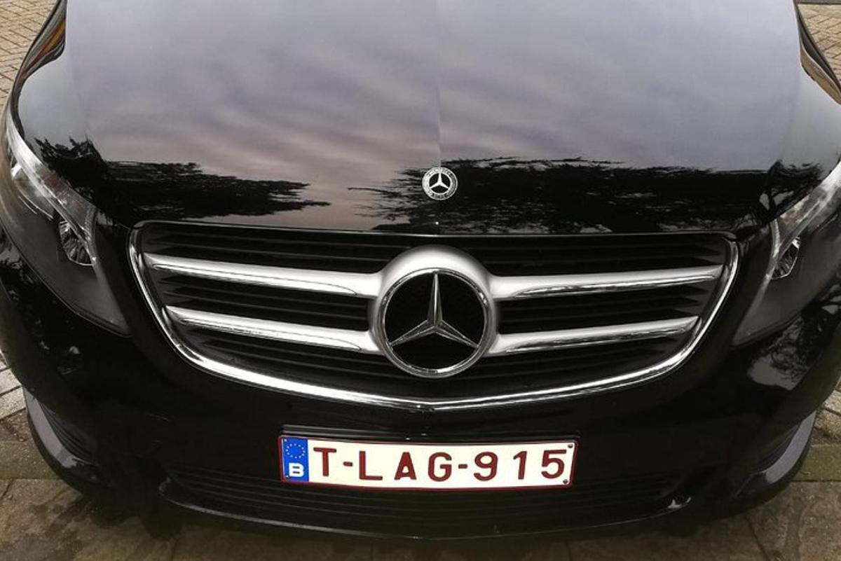 a mercedes benz car with a license plate on it