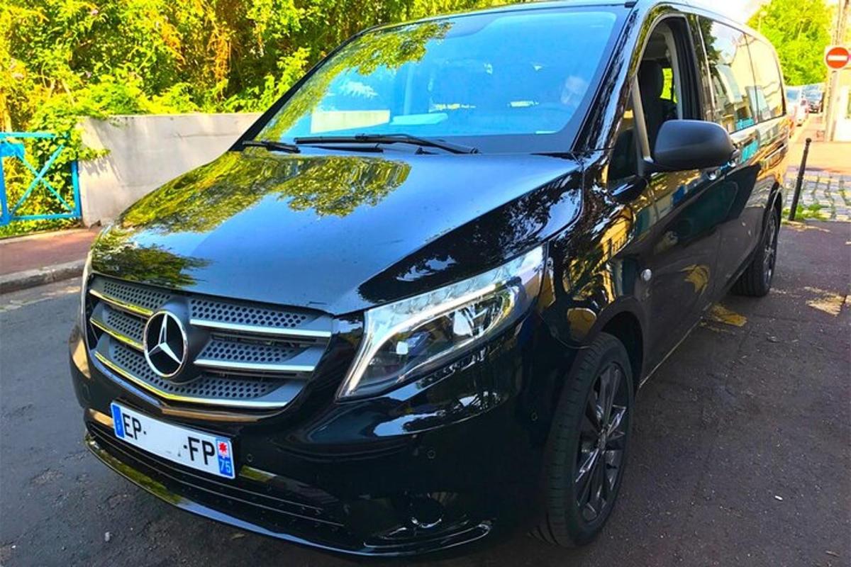 a black car parked in a parking lot