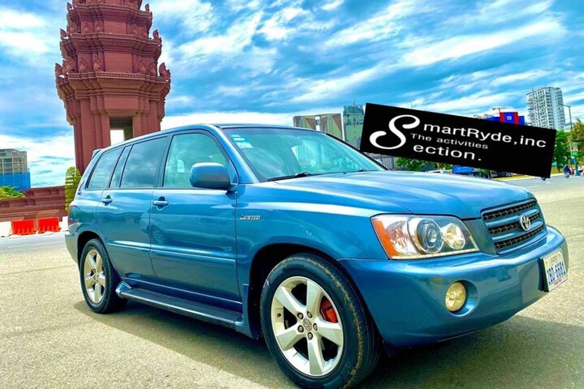 a blue car parked in front of a building