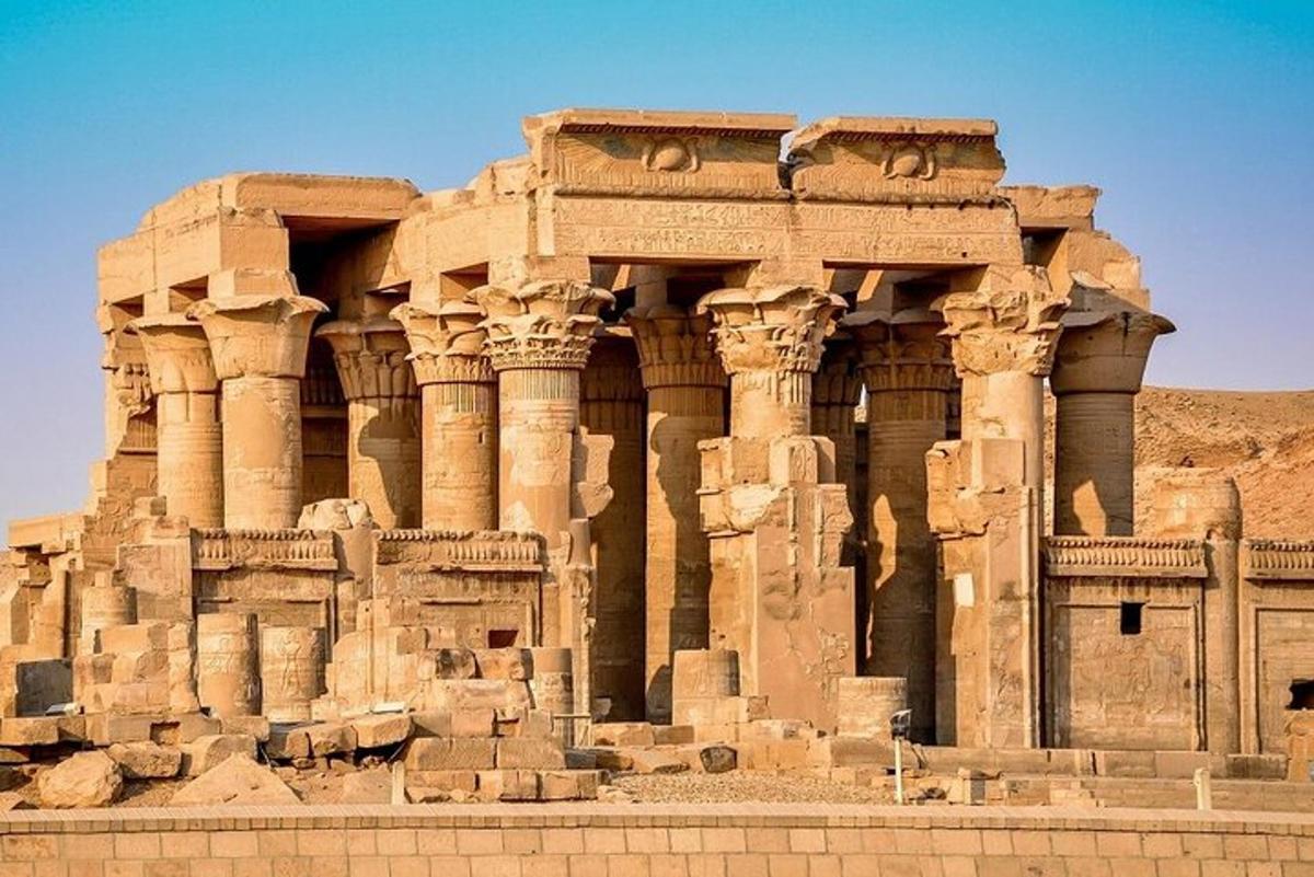 an ancient building with columns in the desert