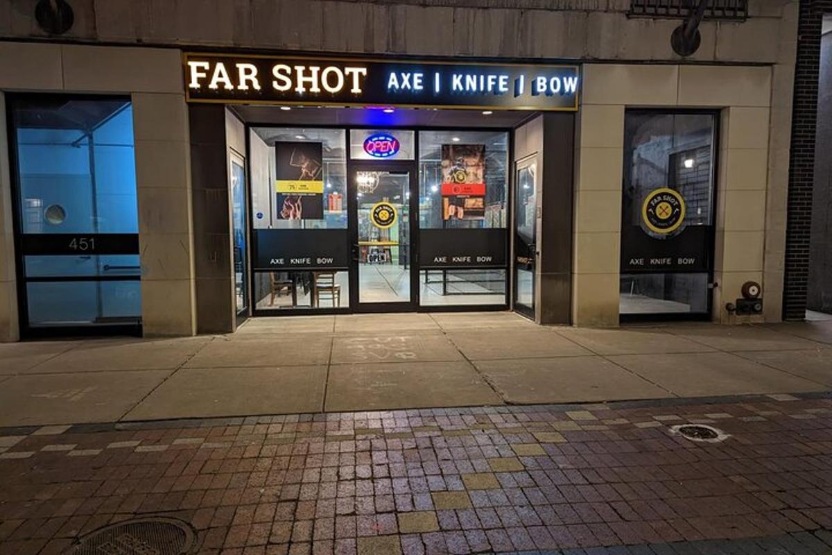 a store front with a sign that reads far shot are i mine i bow