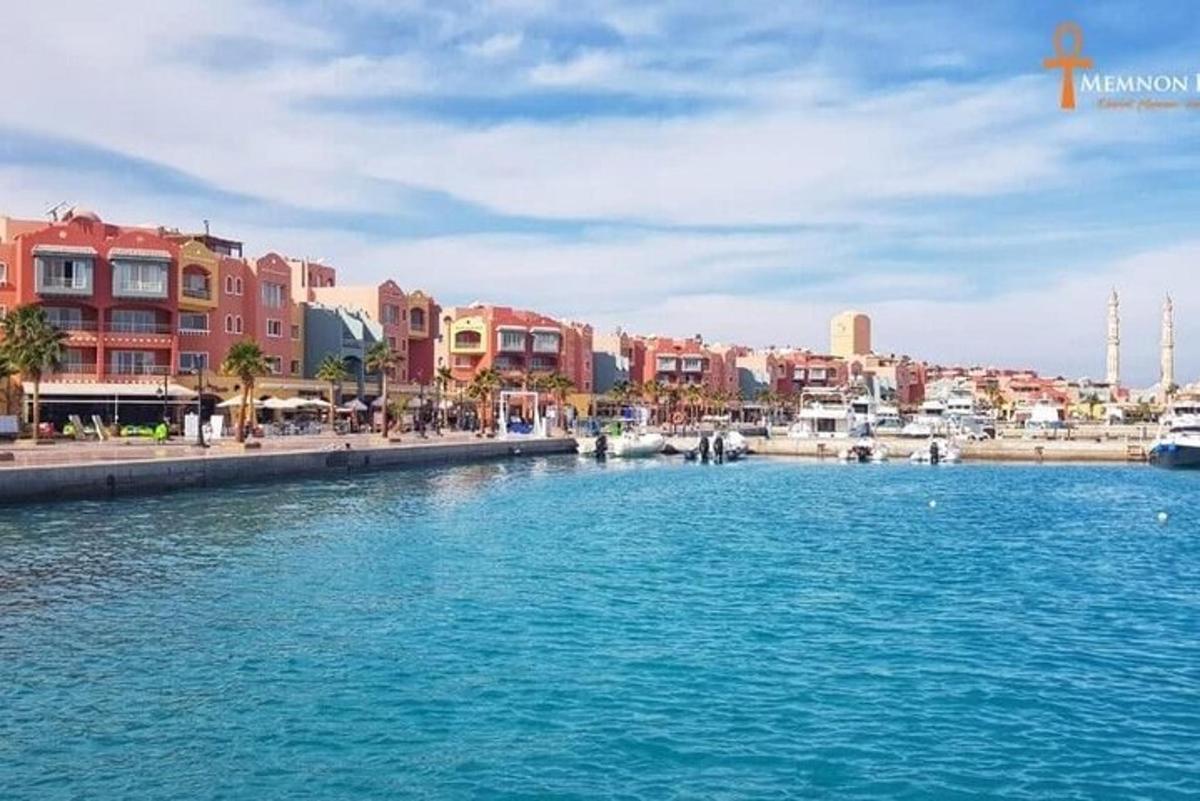 a large body of water in a city with buildings
