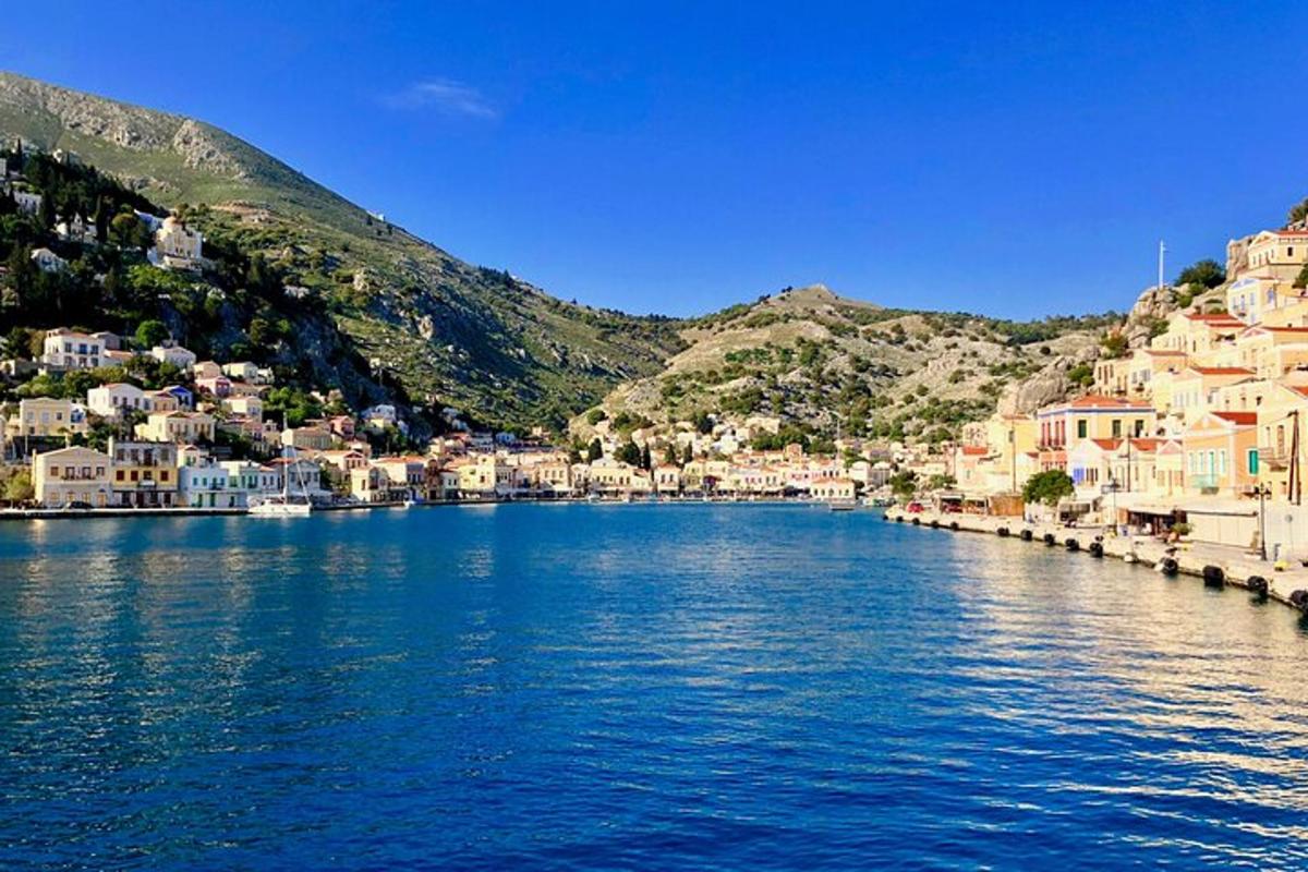 a view of a large body of water with houses
