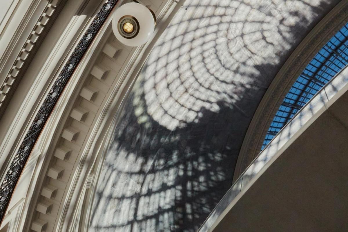 a reflection of a stained glass window in a building