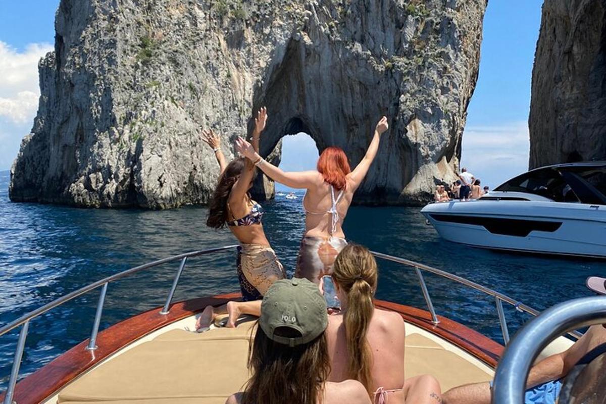 a group of people on a boat in the water