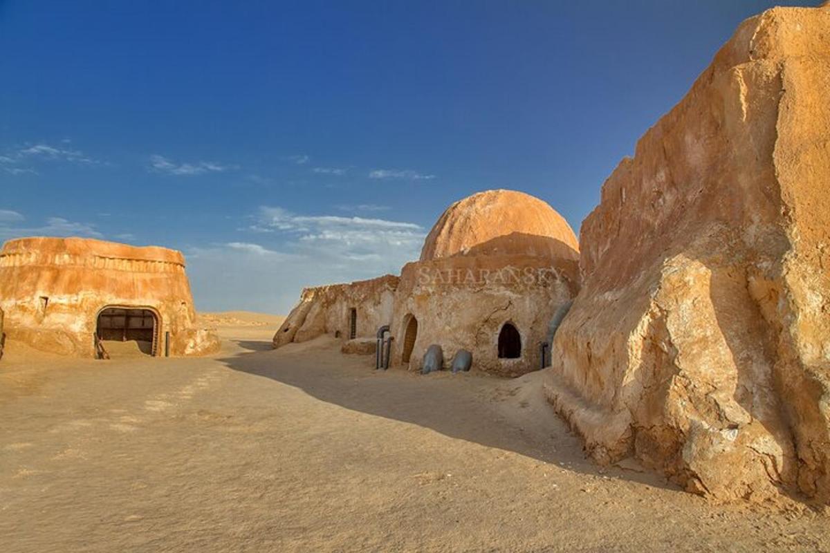 an old building in the middle of the desert