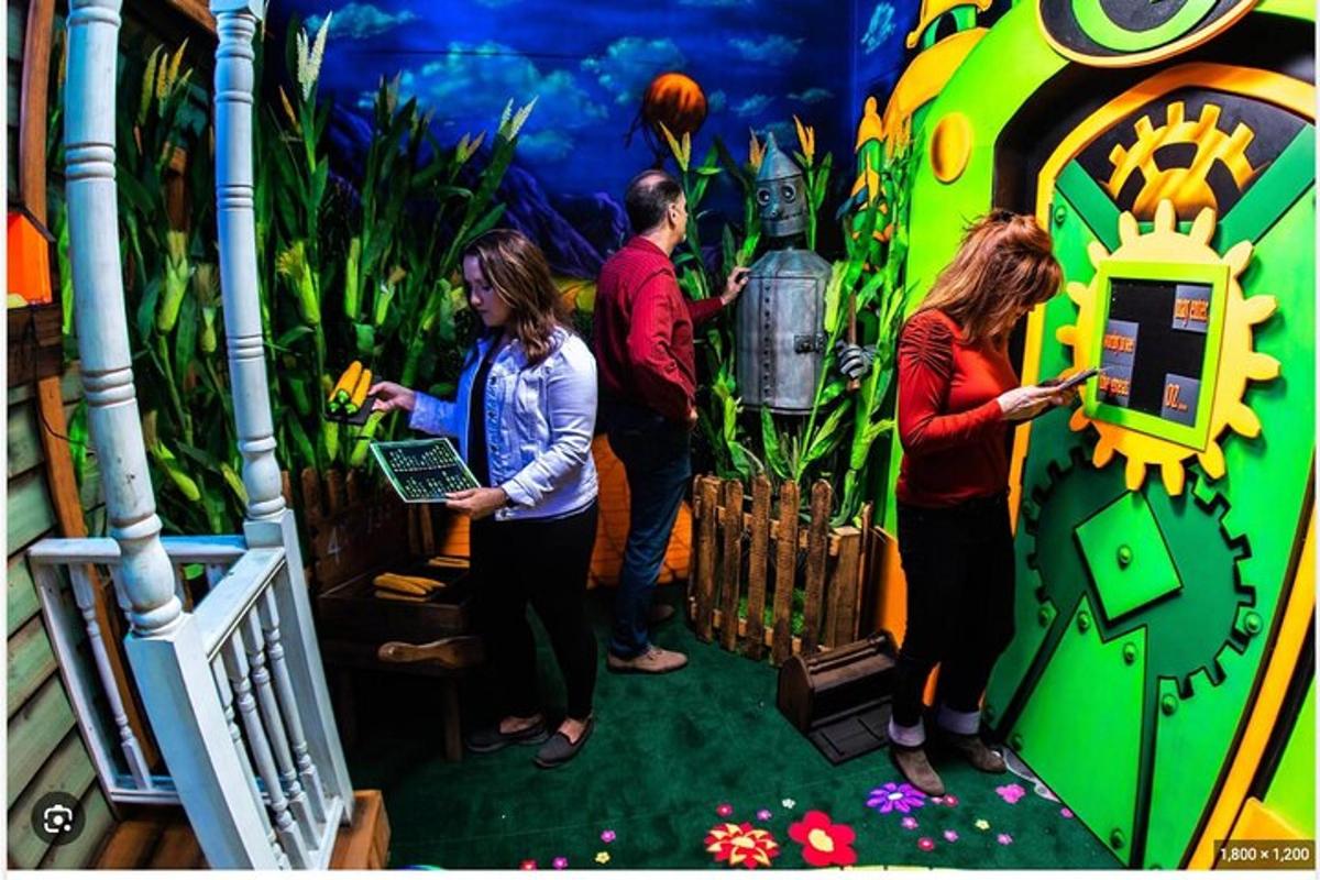 a group of people standing in a game room