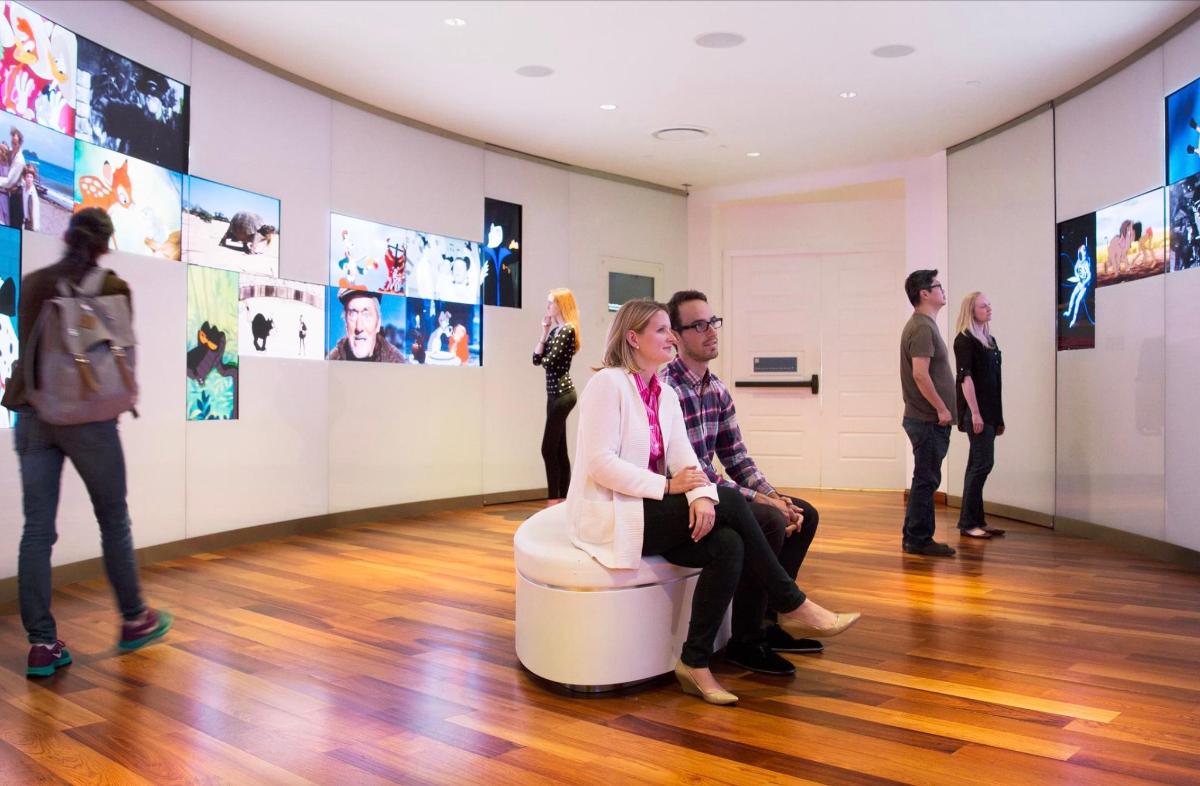 a group of people in an art exhibit