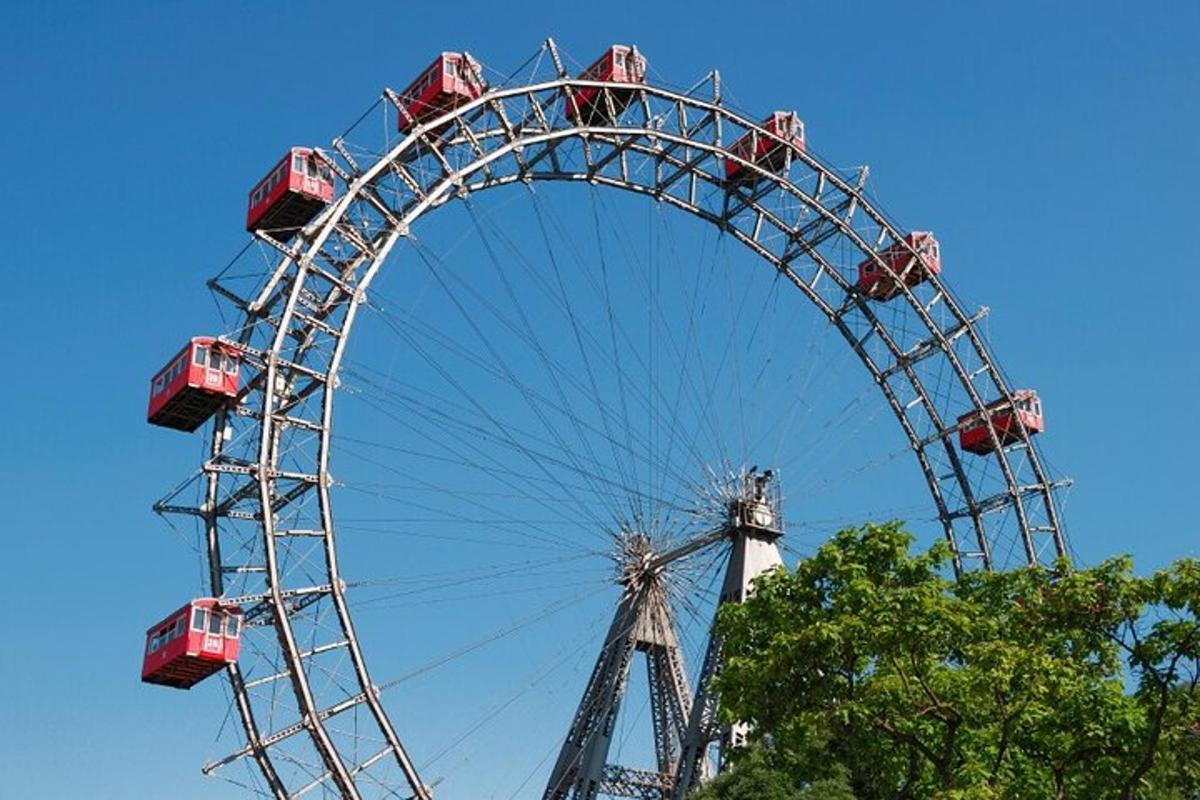 a ferris wheel in a park with a blue sky