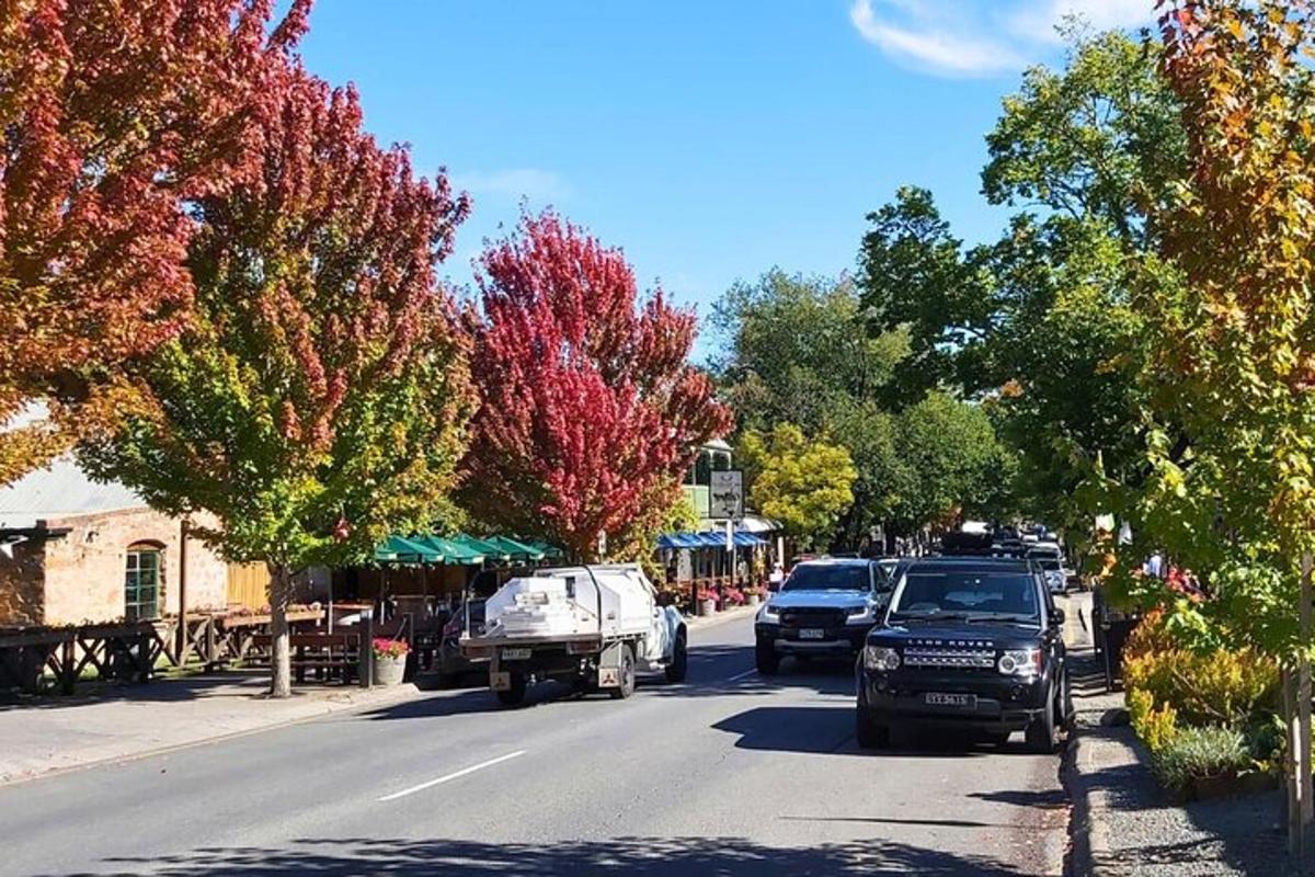 a street with cars parked on the side of the road