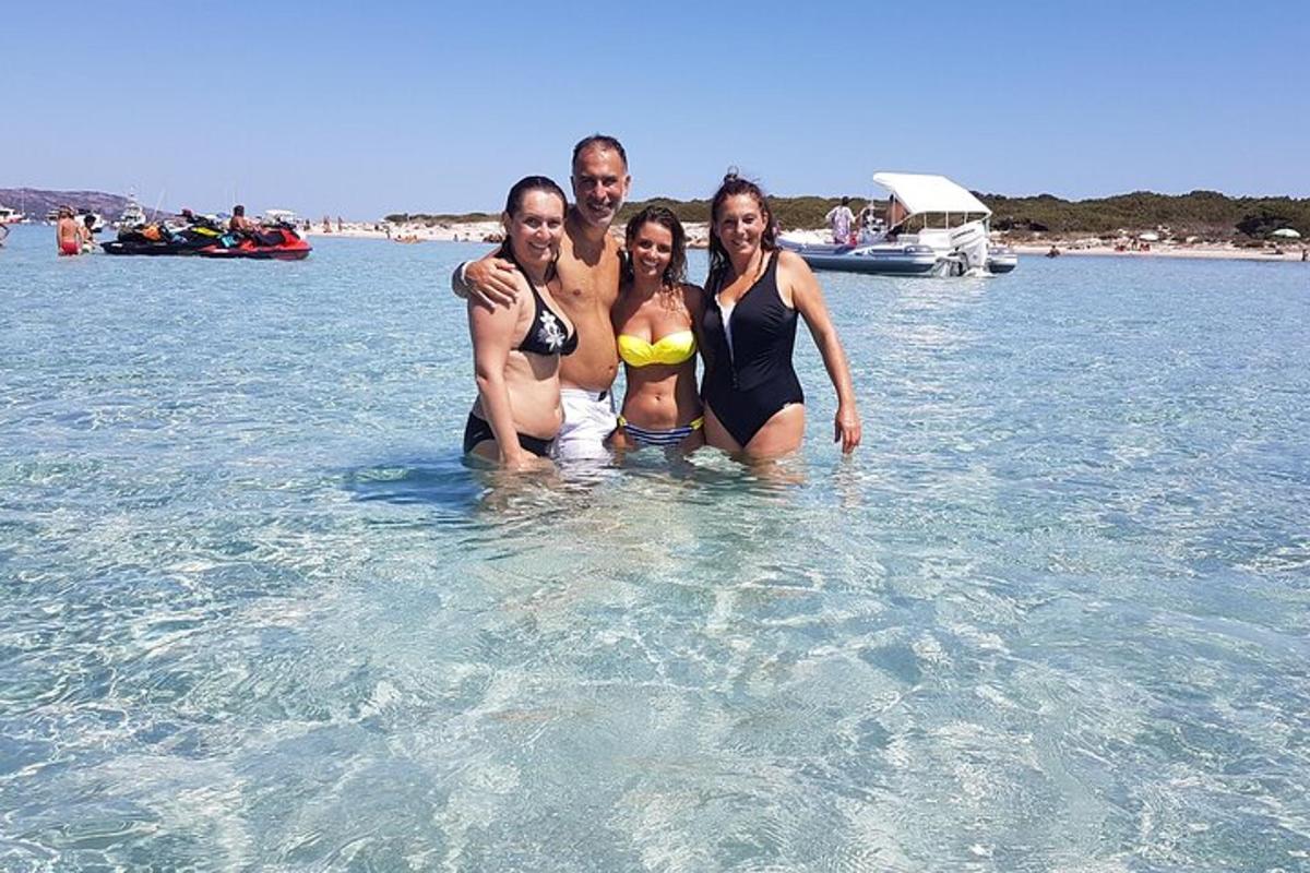 a group of people standing in the water