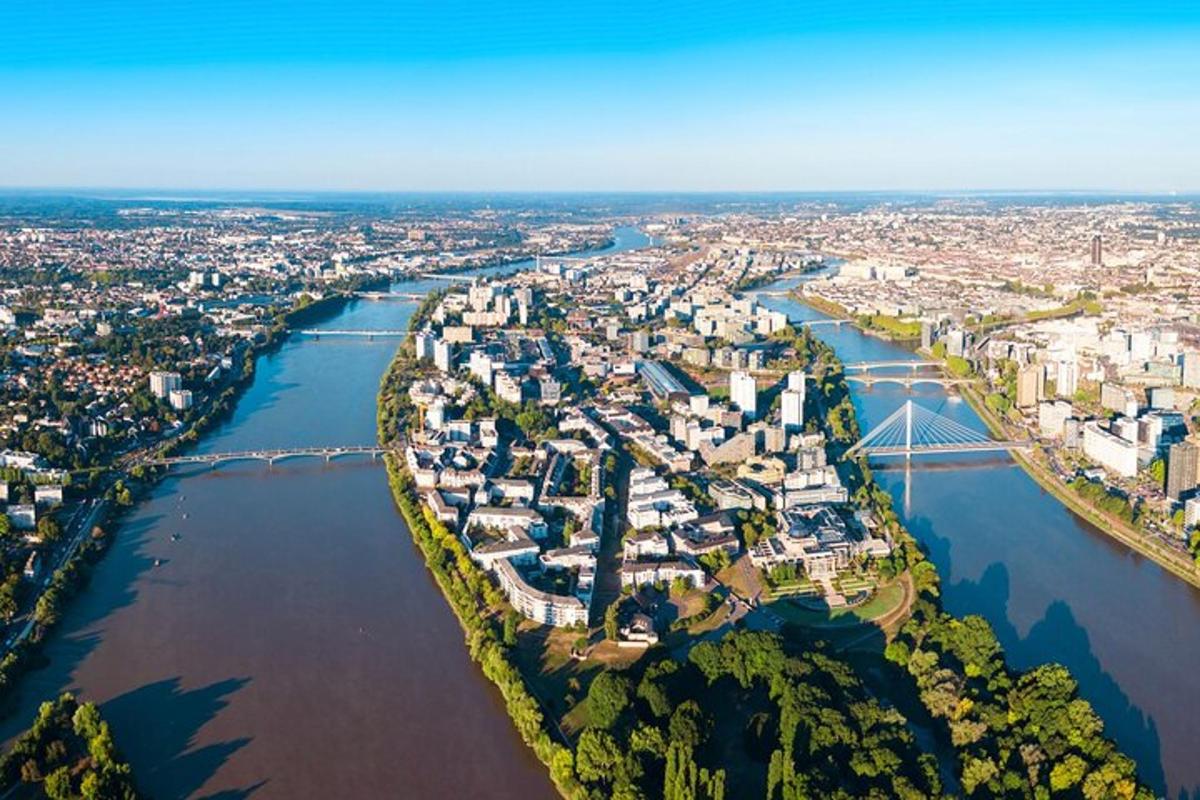 an aerial view of a city with a river
