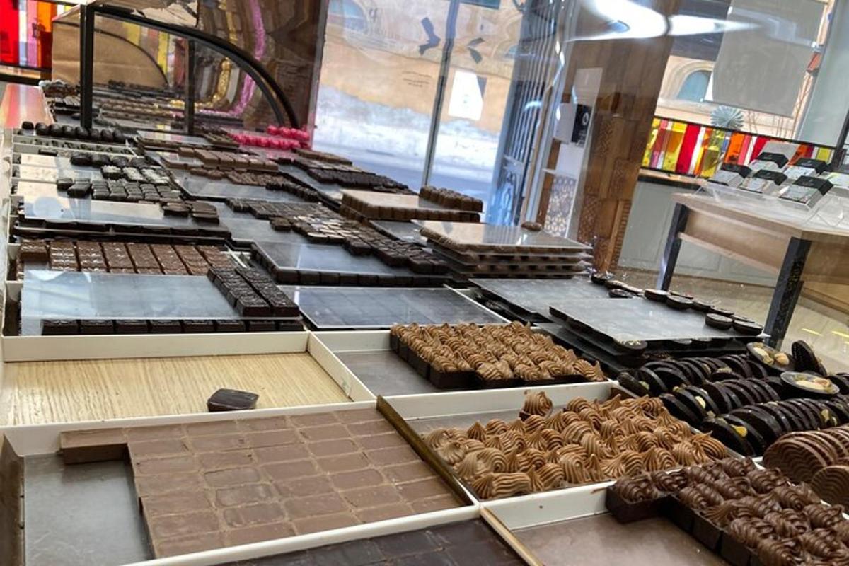 a bakery with a bunch of different types of chocolate