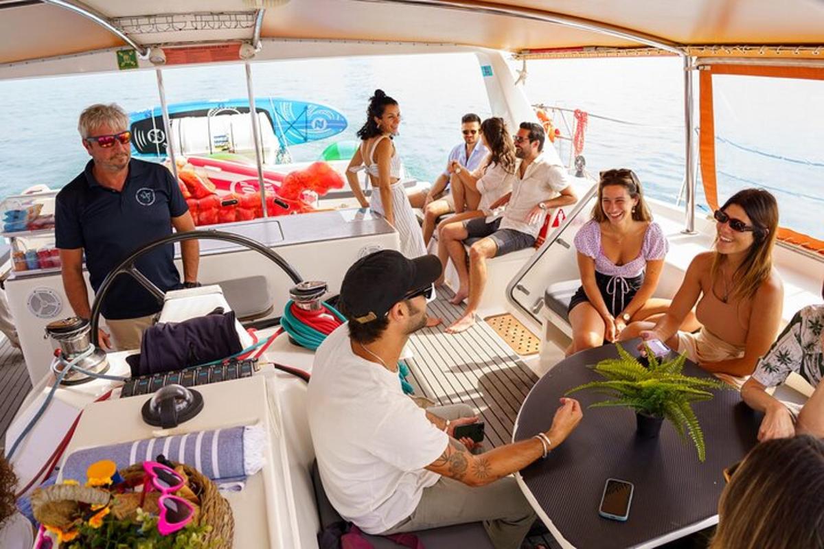 a group of people sitting on a boat