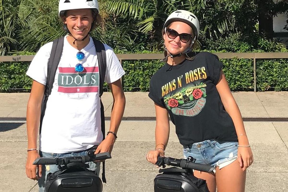 a man and a woman riding on a motorcycle