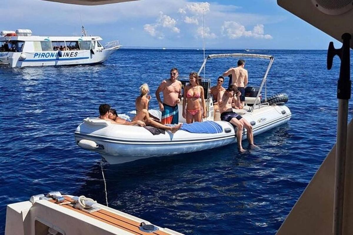 a group of people on a boat in the water