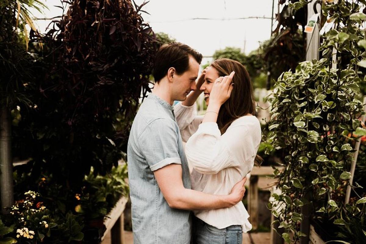 a man and a woman standing in a garden