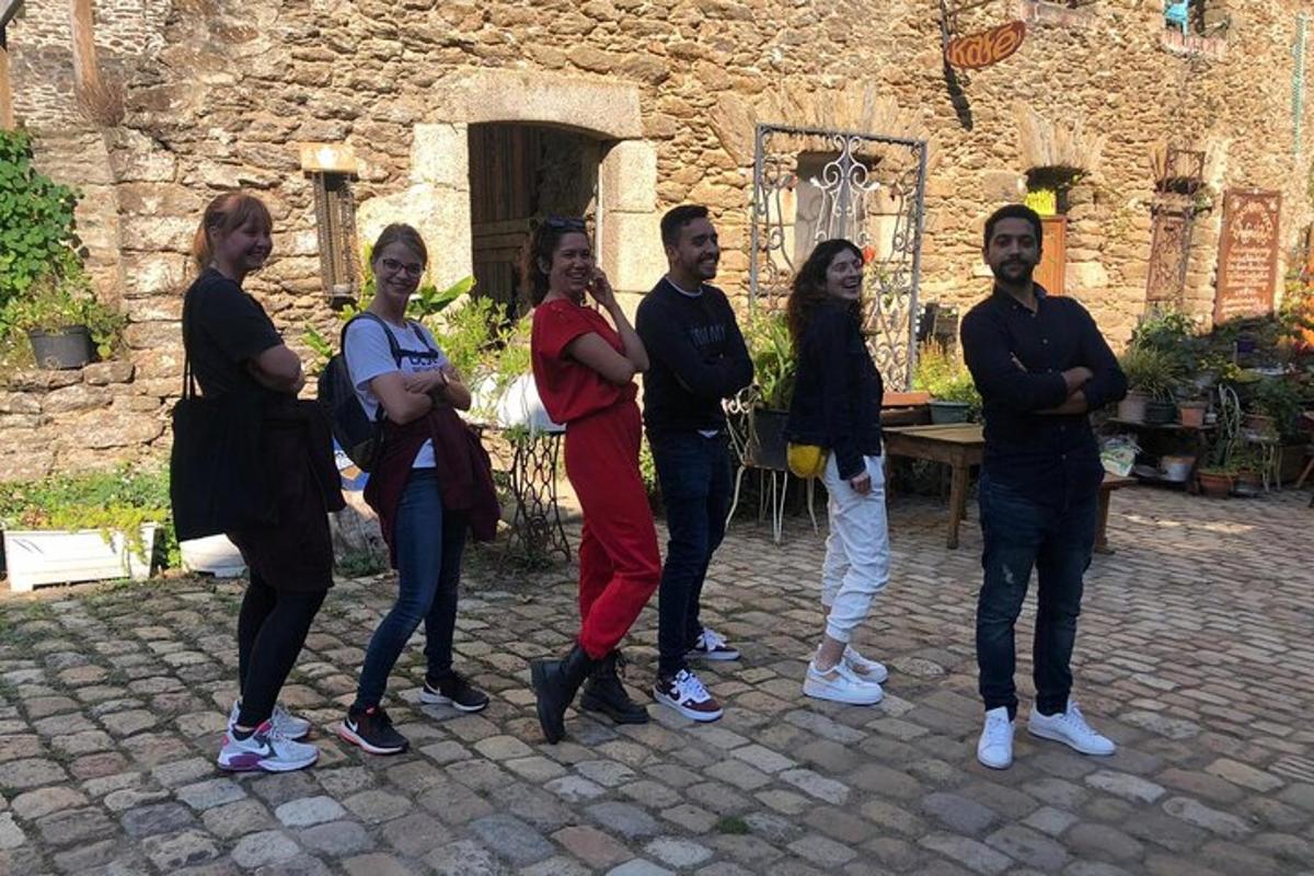 a group of people standing in front of a building