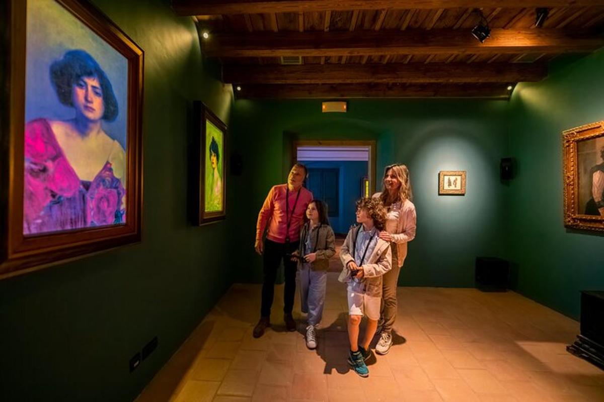 a family looking at a painting in a museum